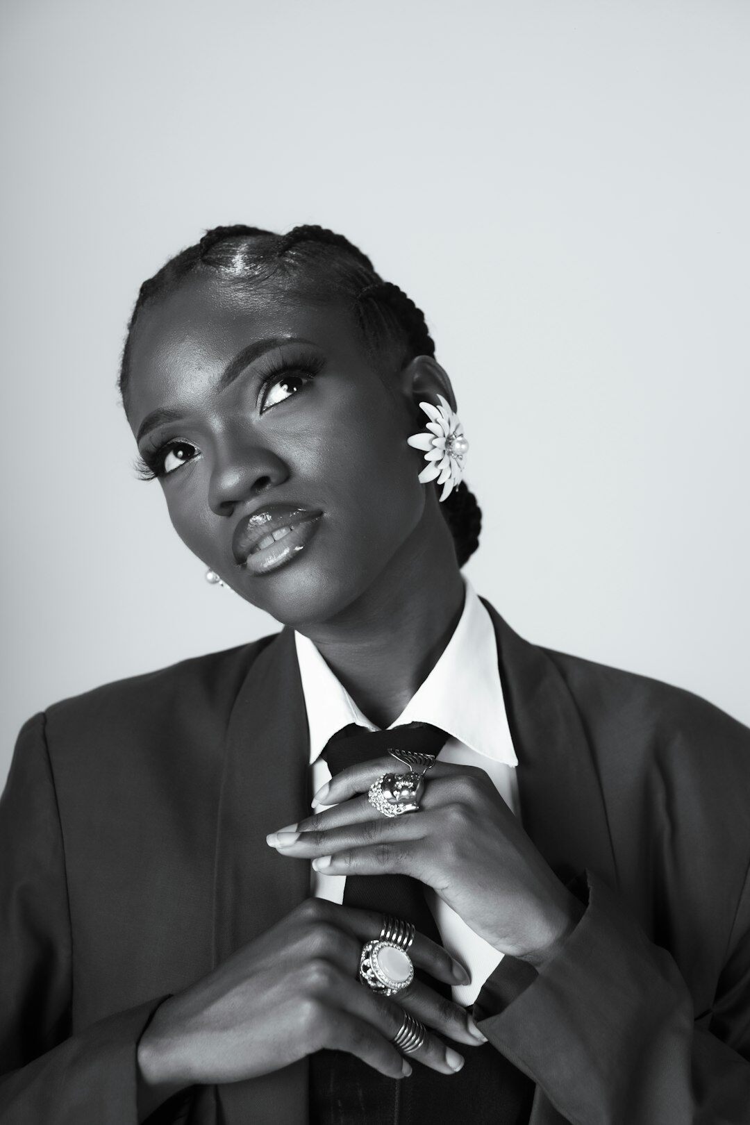 Studio portrait of a Black woman in business attire smiling